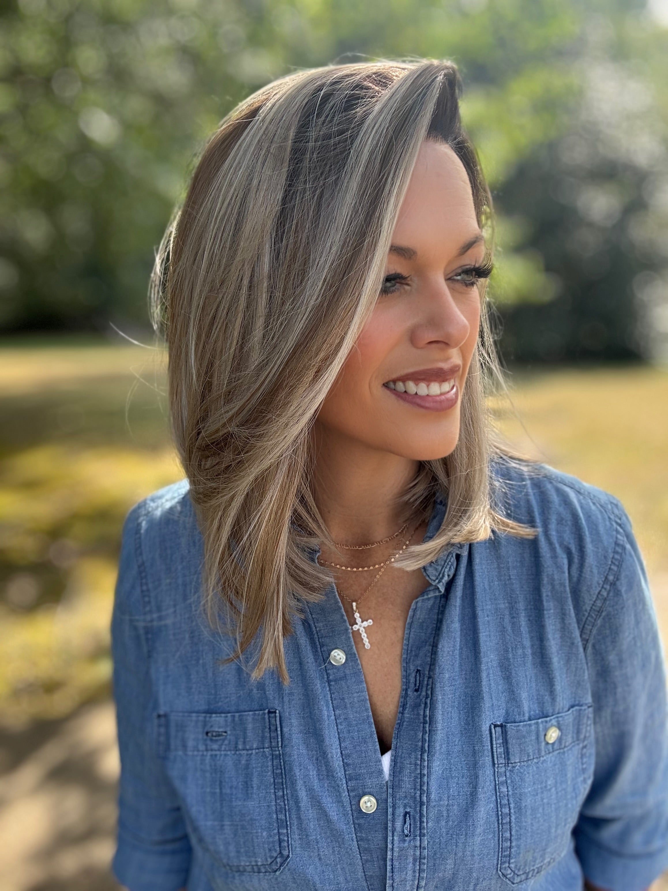 Edie rooted blonde